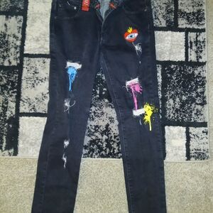Trendy Black Skinny Jeans with Colorful Paint Splashes